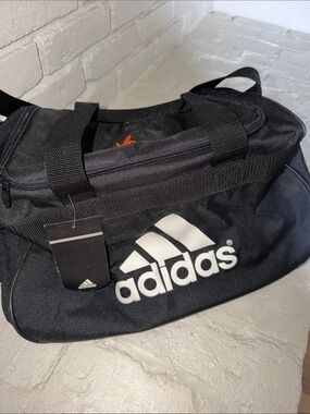 Small light weight Adidas duffel bag. Monogrammed to X games Los Angeles